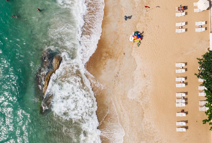 Drone view of Canggu beach coastline - popular villa area in Bali