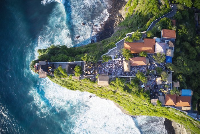 Aerial view of Uluwatu cliffs and ocean - villa investment area in Bali