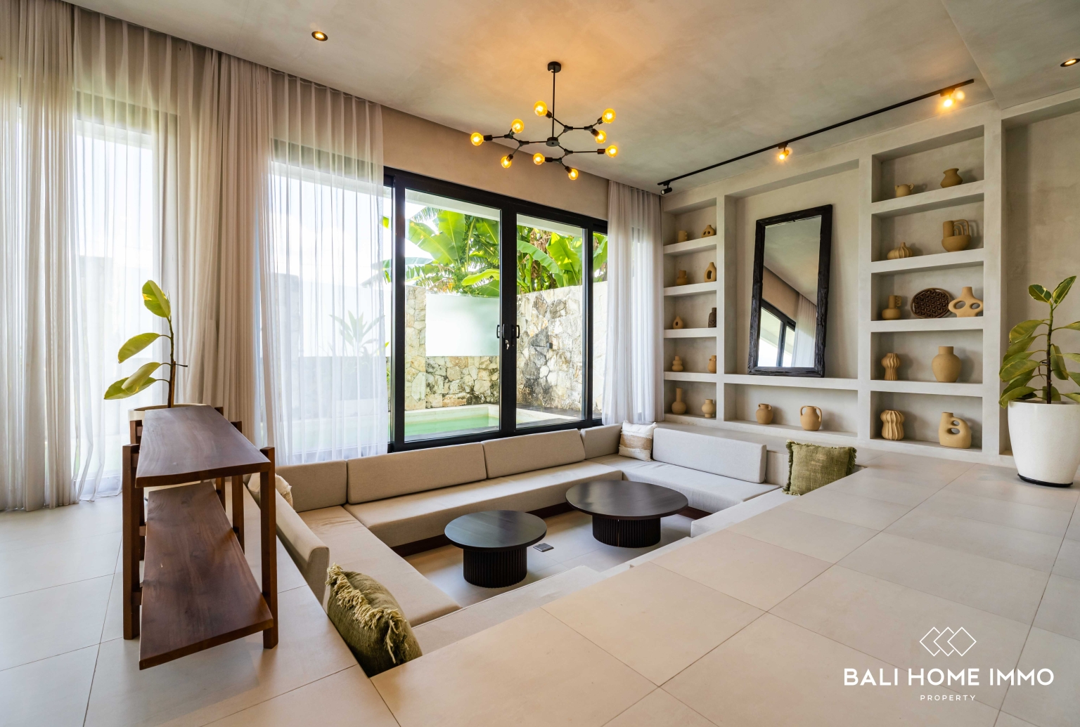 Beautiful 3 bedrooms villa for sale leasehold in Bali Canggu residential side view 3