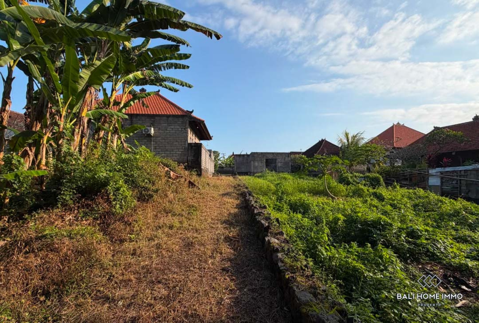 Riverside land in residential area for sale leasehold in Bali Near Canggu residential side view 7